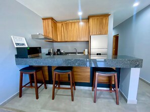 Comfort Apartment, 2 Bedrooms, Mountainside | Private kitchen | Full-size fridge, microwave, oven, coffee/tea maker - Beautiful New Condo Sea Breeze (Cabo San Lucas)