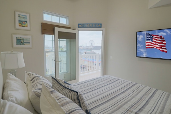 3 habitaciones, tabla de planchar con plancha y cuna de viaje