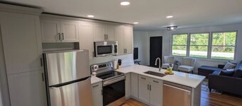Beautiful home with 150ft sandy beach and private boat launch on Big Sebago!!!!!