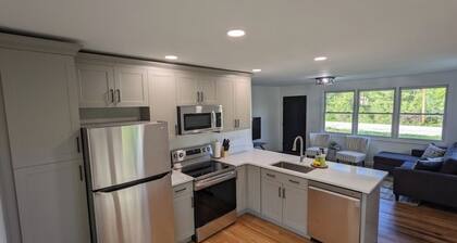 Beautiful home with 150ft sandy beach and private boat launch on Big Sebago!!!!!