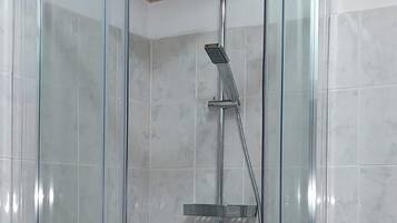 Shower, free toiletries, hair dryer, towels