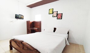 Standard Double Room | Down comforters, desk, blackout drapes, iron/ironing board - Wisma Mulia Syariah (Bandar Lampung)