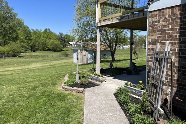 Primary entrance through the side and back patio.