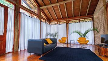 Double Suite | Living area | 42-inch flat-screen TV with cable channels