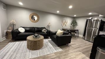 Smart TV, fireplace, books, stereo