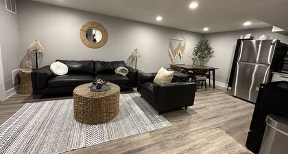 Luxury lower level , pet friendly, fully fenced yard