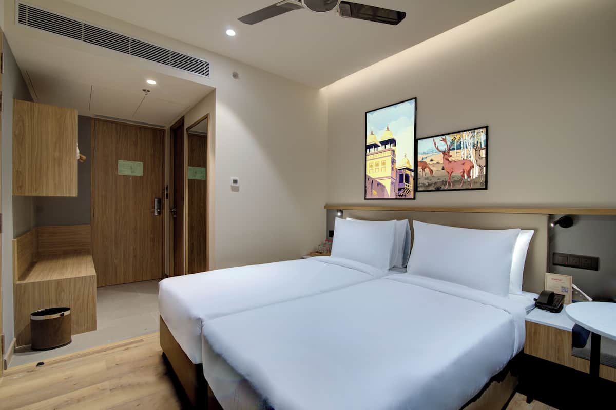 Habitación Deluxe con 2 camas individuales | Sábanas de algodón egipcio, ropa de cama de alta calidad, minibar