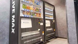 A vending machine labeled "LIVE MAX" with various beverages and snacks. - Hotel Livemax Kamata Ekimae (Tokyo)