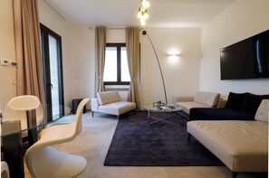 Family Suite | Living area | Flat-screen TV