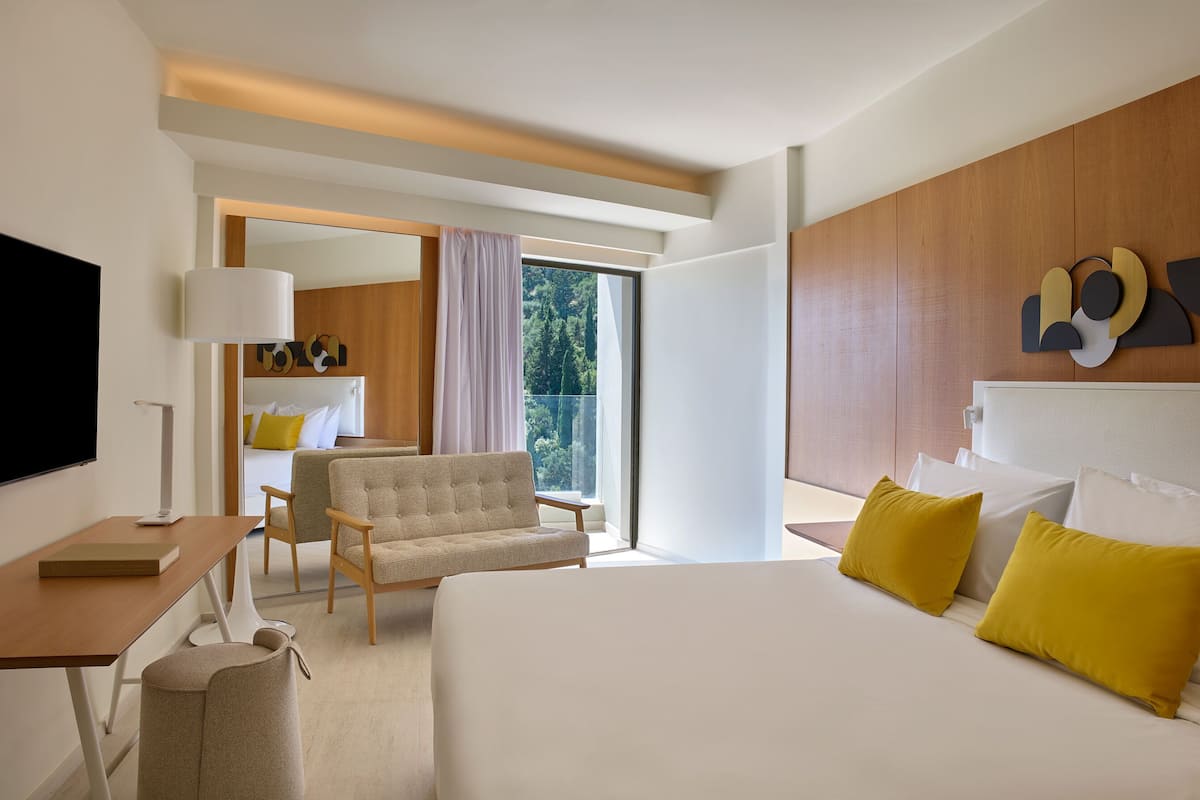 Deluxe Double/Twin Room Side Sea View | 1 Schlafzimmer, kostenlose Minibar, Zimmersafe, Schreibtisch