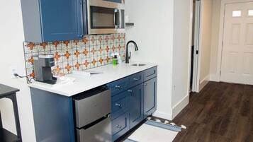 Fridge, microwave, coffee/tea maker, highchair