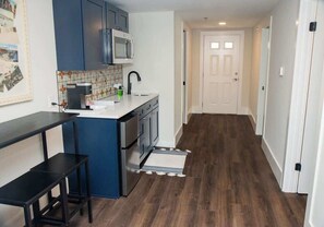 Fridge, microwave, coffee/tea maker, high chair