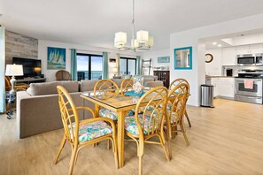 Interior - Discover paradise at Seascape Towers in New Smyrna Beach. This 3BR/2BA oceanfront condo features a remodeled walk-in shower, spacious layout, and wraparound balcony with sweeping views—just steps from the sand and local attractions. (New Smyrna Beach)