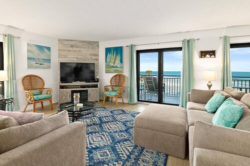 Discover paradise at Seascape Towers in New Smyrna Beach. This 3BR/2BA oceanfront condo features a remodeled walk-in shower, spacious layout, and wraparound balcony with sweeping views—just steps from the sand and local attractions.