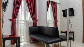 Apartemen, 1 kamar tidur | Area keluarga | TV