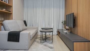 Apartemen, 1 kamar tidur | Area keluarga | TV