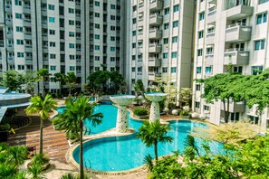 Outdoor pool - Stunning and Comfy 2BR (No Kitchen) at Sky Terrace Apartment (Jakarta)