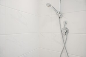 Apartment, 2 Bedrooms | Bathroom | Shower, free toiletries, towels, soap