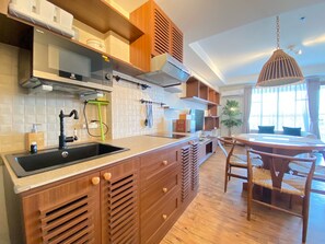 Departamento, 2 habitaciones | Cocina privada | Refrigerador y utensilios de cocina 