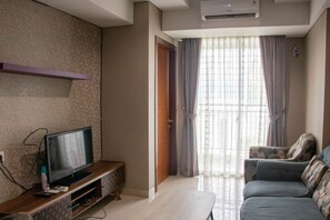 Apartment, 2 Bedrooms | Living area | TV