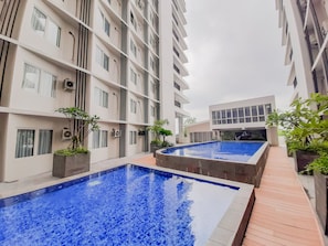 Outdoor pool - Comfort Studio Apartment At Padina Soho Residence (Tangerang)