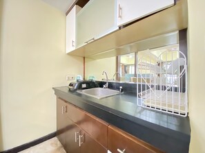 Departamento, 2 habitaciones | Cocina privada | Refrigerador y utensilios de cocina