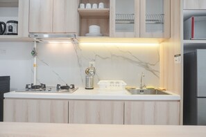 Departamento, 2 habitaciones | Cocina privada | Refrigerador y utensilios de cocina 