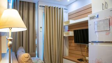 Apartment, 1 Bedroom | Living area | TV