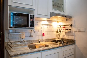 Apartment, 1 Bedroom | Private kitchen | Fridge, cookware/dishes/utensils - Nice And Cozy 1Br With Extra Room Apartment At Capitol Park Residence (Jakarta)