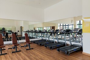 Stay fit on your travels with access to a fully equipped gym featuring treadmills, weight machines, and free weights.