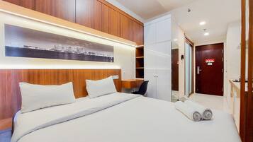 Apartemen, 2 kamar tidur | Didekorasi berbeda-beda dan dilengkapi dengan perabotan berbeda-beda