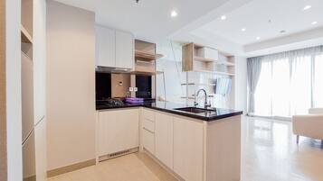 Apartment, 1 Bedroom | Private kitchen | Fridge, stovetop, electric kettle, cookware/dishes/utensils