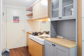 Apartment | Private kitchen - Comfortable Studio Apartment At M-Town Residence (Gading Serpong)
