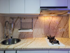 Departamento, 2 habitaciones | Cocina privada | Refrigerador y utensilios de cocina 