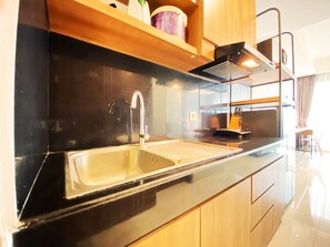 Apartment | Private kitchen - Cozy Studio Room At Green Kosambi (Greko) Apartment (Bandung)