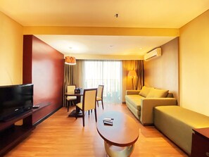 Apartment | Living area | TV - Fancy And Nice Studio At El Royale Apartment (Bandung)