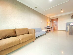 Apartment, 1 Bedroom | Living area | TV