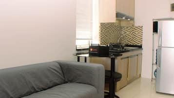 Apartment, 1 Bedroom | Living area | TV