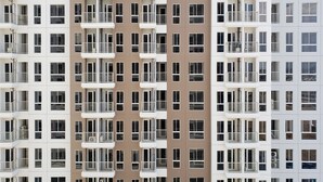 A multi-story residential building with balconies and windows. - Minimalist And Tidy 2Br Apartment At Tokyo Riverside Pik 2 (Teluknaga)