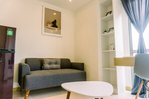 Apartment, 1 Bedroom | Living area | TV