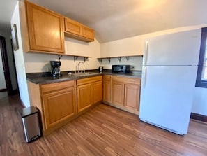 Fridge, microwave, oven, stovetop - The Tiny Piney  - Live. Work. Play. Downtown Green Bay! (Green Bay)