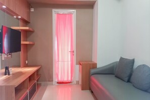 Apartment, 1 Bedroom | Living area | TV