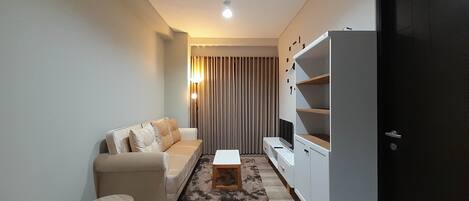 Apartment, 1 Bedroom | Living area | TV