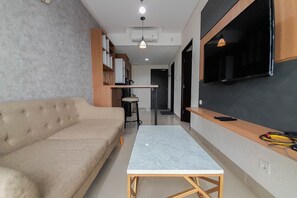 Apartemen, 1 kamar tidur | Area keluarga | TV