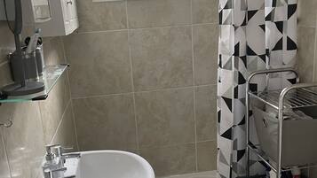 Shower, towels, soap, shampoo