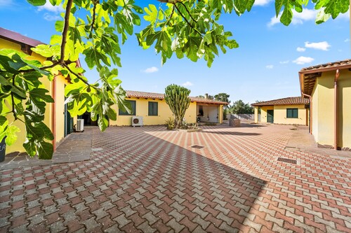Residence Sulcis 4 with Mountain View, Shared Terrace & A/C