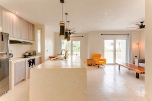 Fridge, microwave, stovetop, coffee/tea maker