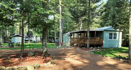 Cozy nestled in quiet neighborhood. On snowmobile and ATV trail.