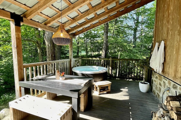 Outdoor chill zone: eat, soak, breathe deep in the woods.