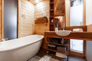 Shower, hair dryer, towels, shampoo